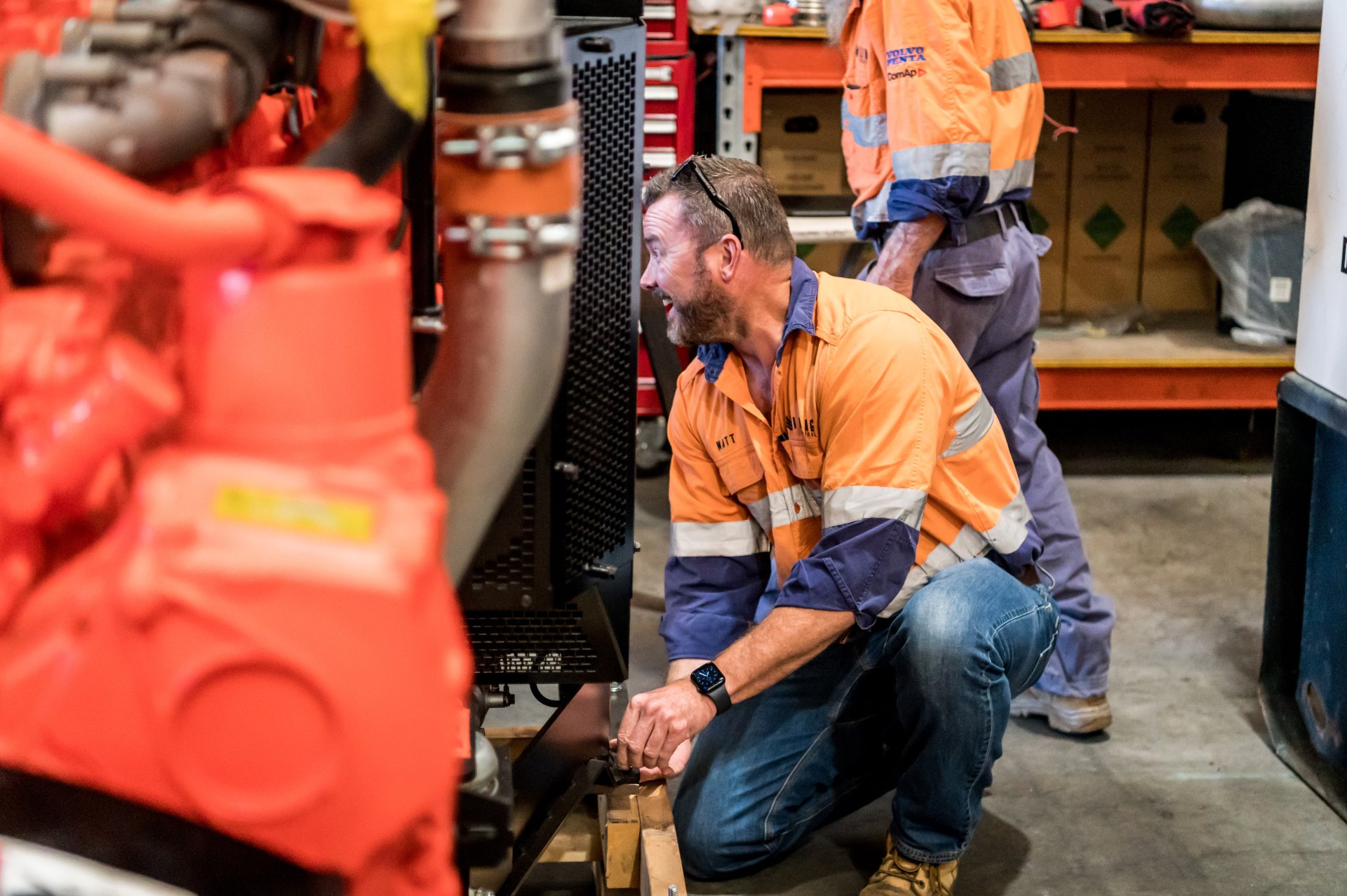 Man Working On Diesel Generator